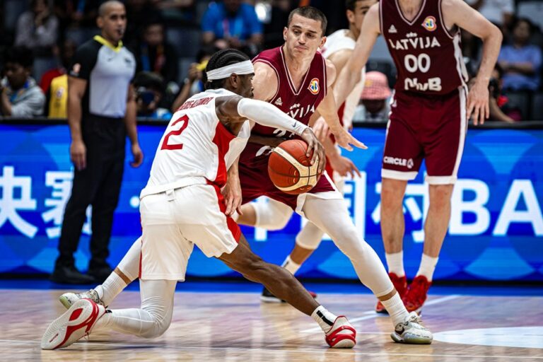 Shai Gilgeous-Alexander faisiant un cross-over spectaculaire face à la Lettonie en première phase de la Coupe du Monde